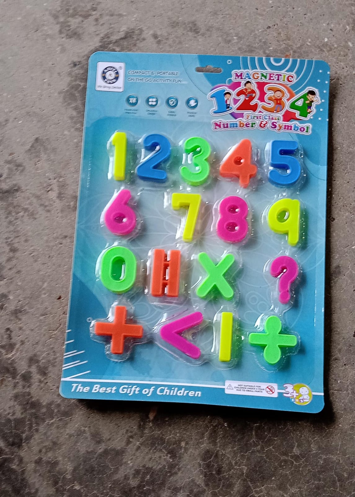 Educational toy with magnetic numbers for interactive play. Educational toy with magnetic numbers for interactive play.